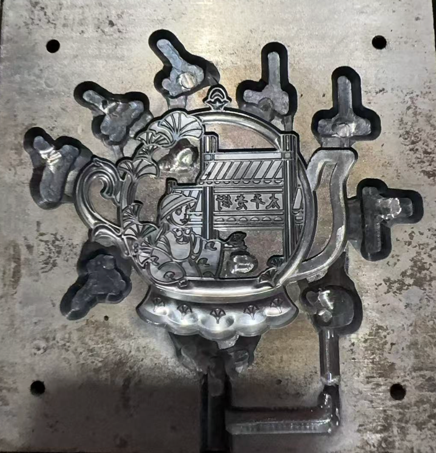 A die-casting mold and newly formed decorative metal component