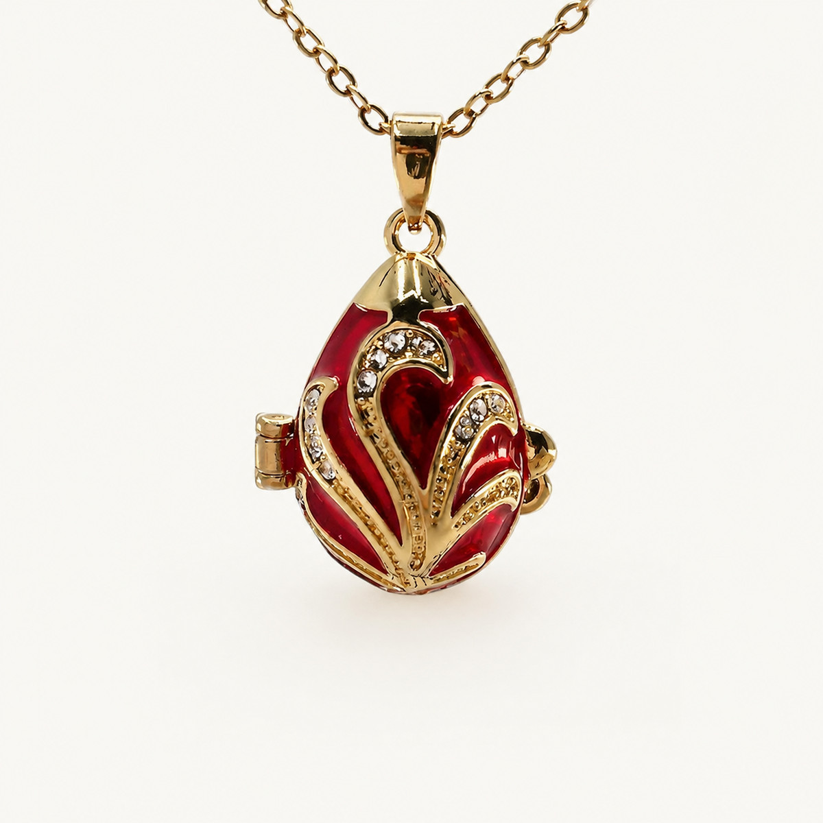 Crystal Leaf Scroll Faberge Egg Locket Pendant