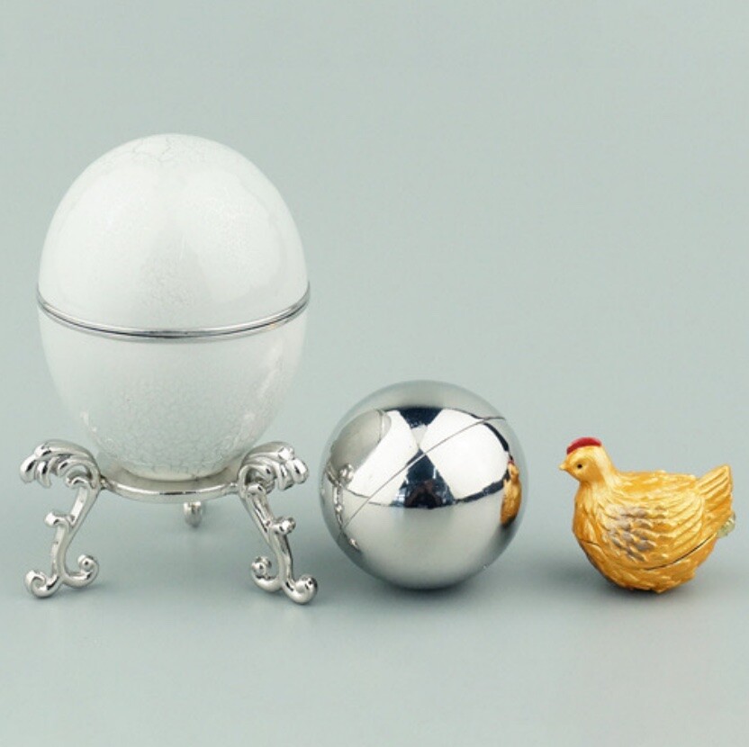 Silver-finish Hen Egg reproduction with metallic yolk and miniature hen
