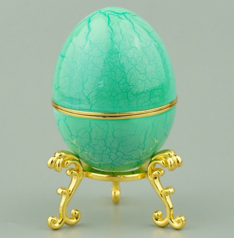 Turquoise crackle enamel Hen Egg reproduction on a gold-plated stand