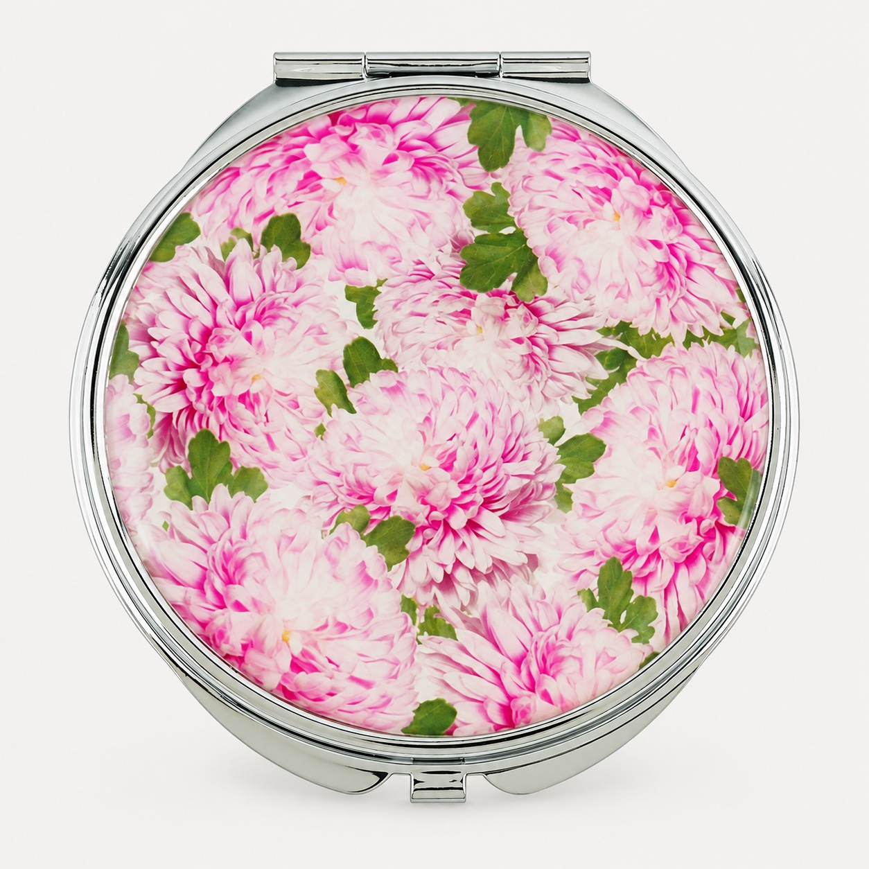 Round metal compact mirror with a pink floral printed epoxy top