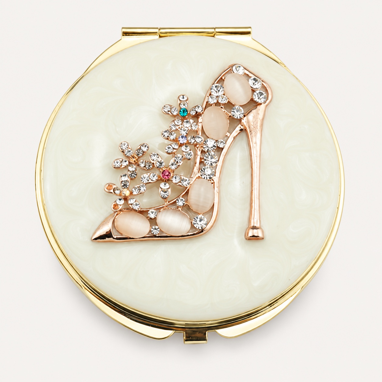 Ivory compact mirror with a crystal high-heel shoe decoration