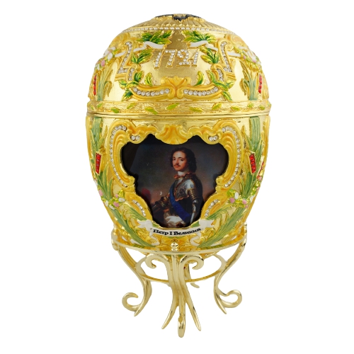 Royal-style portrait medallion enamel egg on a gold-tone stand