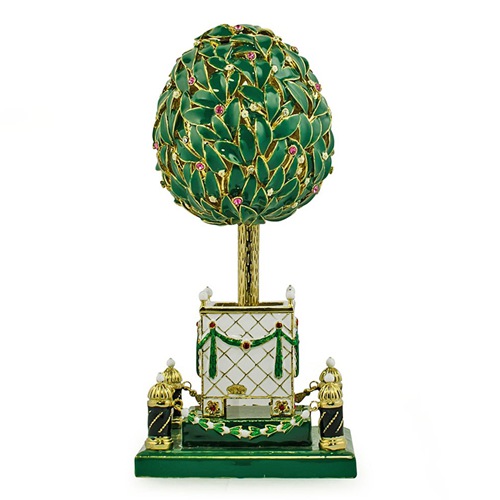 Green jeweled topiary egg on an architectural base