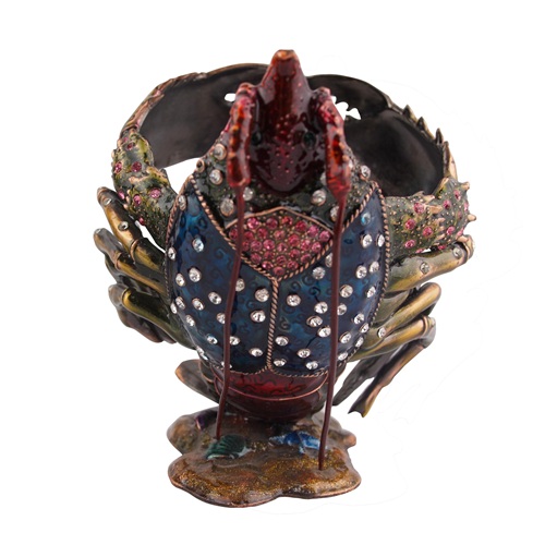 Front detail of a bejeweled large lobster wine bottle holder