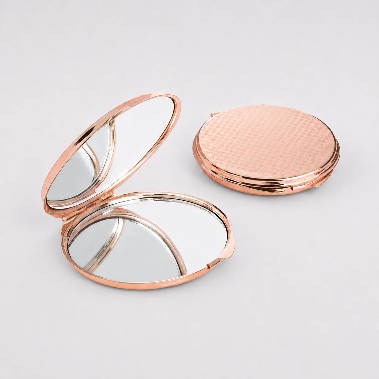 Plain Round Metal Compact Mirror with Textured Lid - view 1