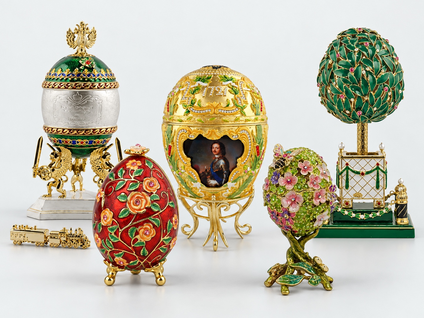 A collection of royal, floral and functional Faberge-style metal eggs