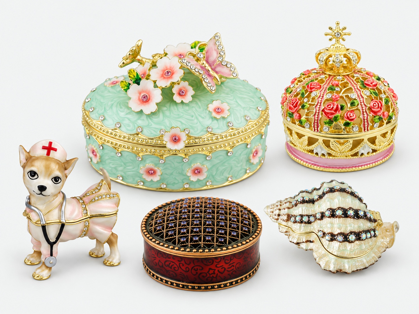 A collection of floral, animal, royal and sea-life metal trinket boxes
