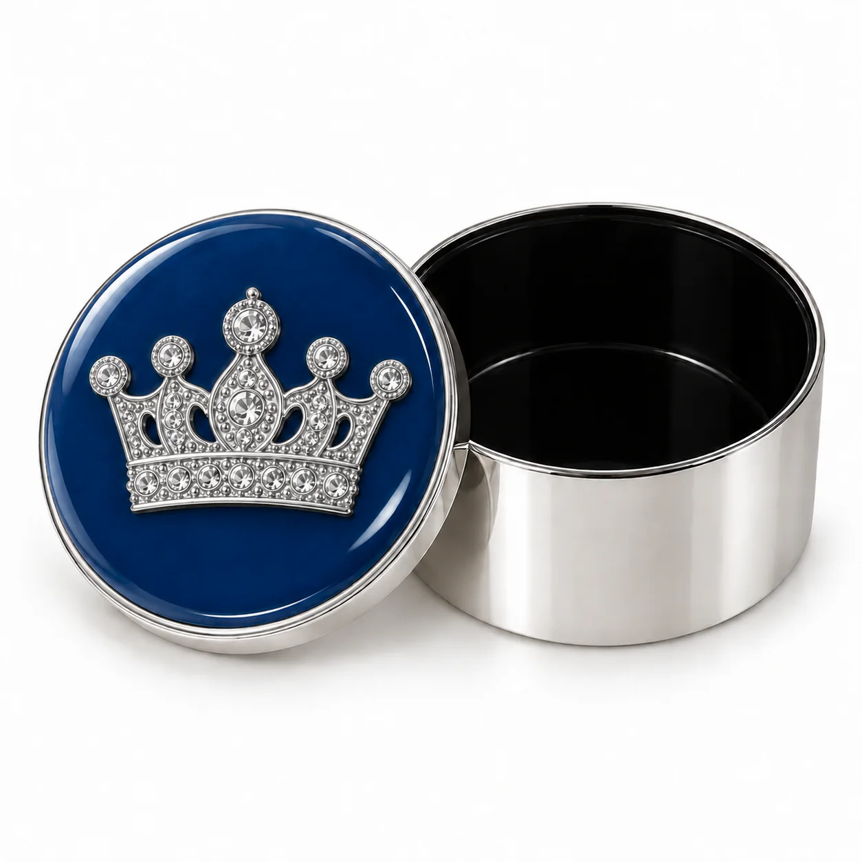 Round blue enamel metal trinket box with crystal crown decoration and its lid removed